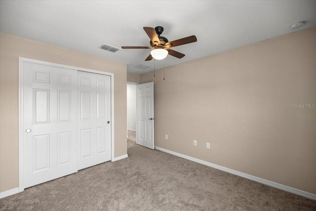 7695 SW 64th Street Rd, Ocala, FL 34474 - unfurnished bedroom with carpet, a closet, and ceiling fan