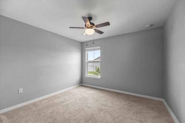 7695 SW 64th Street Rd, Ocala, FL 34474 - carpeted empty room with ceiling fan, a smoke detector, and a textured ceiling
