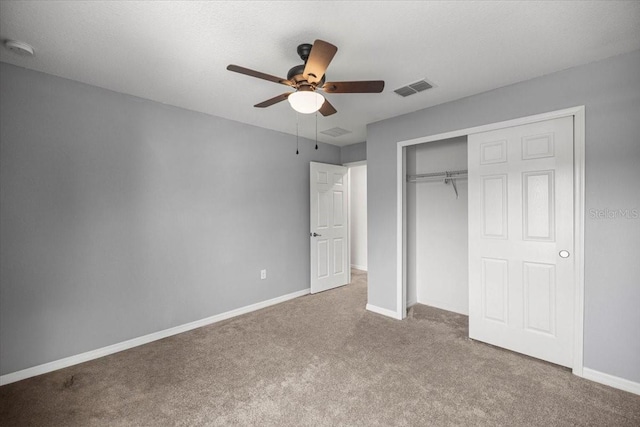 7695 SW 64th Street Rd, Ocala, FL 34474 - unfurnished bedroom with carpet, a closet, and ceiling fan