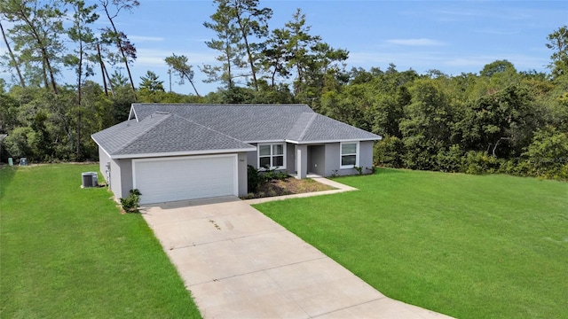 4501 SW 159th Street Rd, Ocala, FL 34473 - ranch-style home featuring a shingled roof, a front lawn, stucco siding, and driveway