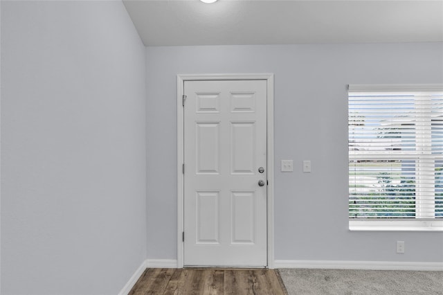 4501 SW 159th Street Rd, Ocala, FL 34473 - foyer entrance with baseboards and wood finished floors
