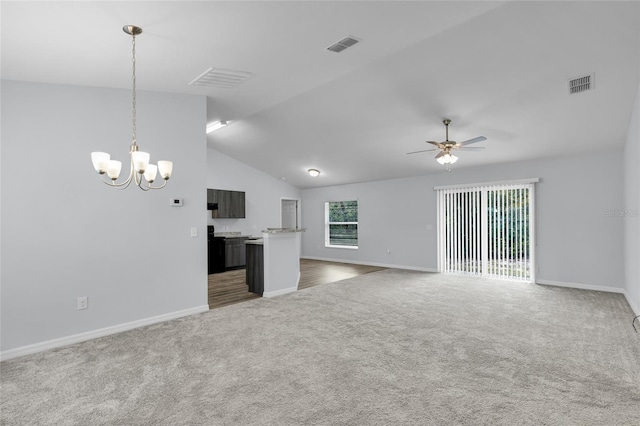 4501 SW 159th Street Rd, Ocala, FL 34473 - unfurnished living room with carpet floors, a chandelier, a ceiling fan, and lofted ceiling