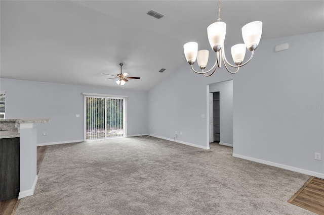 4501 SW 159th Street Rd, Ocala, FL 34473 - unfurnished living room featuring ceiling fan, carpet floors, vaulted ceiling, a fireplace, and a chandelier