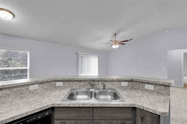 4501 SW 159th Street Rd, Ocala, FL 34473 - kitchen with dishwasher, vaulted ceiling, light countertops, ceiling fan, and light colored carpet