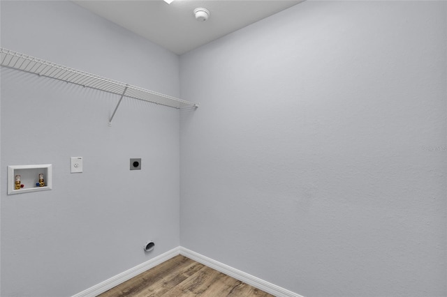 4501 SW 159th Street Rd, Ocala, FL 34473 - washroom with hookup for an electric dryer, washer hookup, and light wood finished floors