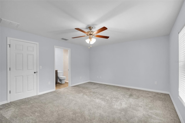 4501 SW 159th Street Rd, Ocala, FL 34473 - unfurnished bedroom featuring carpet floors, ensuite bathroom, and a ceiling fan