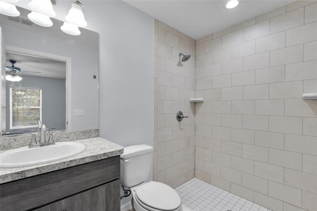 4501 SW 159th Street Rd, Ocala, FL 34473 - bathroom with tiled shower, vanity, and ceiling fan
