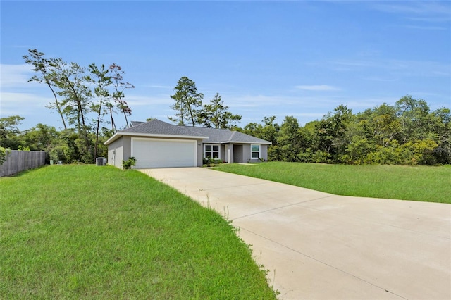 4501 SW 159th Street Rd, Ocala, FL 34473 - ranch-style home with an attached garage, concrete driveway, stucco siding, and a shingled roof