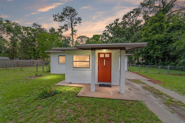 2602 NE 2nd Ave, Ocala, FL 34470 - outdoor structure at dusk with driveway