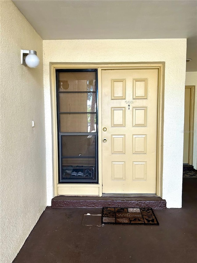 3525 E Fort King St Unit 140, Ocala, FL 34470 - view of exterior entry featuring stucco siding
