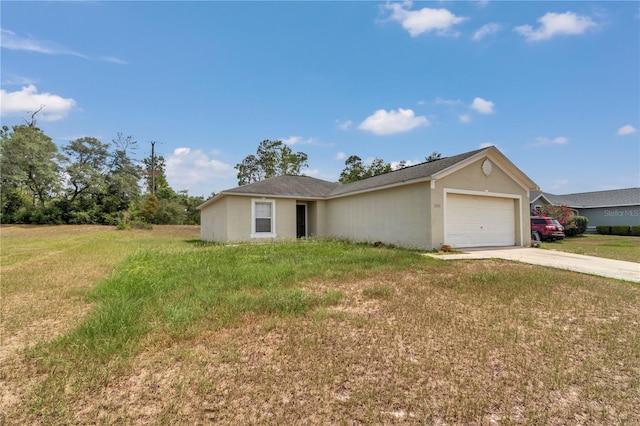 15711 SW 52nd Avenue Rd, Ocala, FL 34473 - ranch-style home featuring an attached garage, driveway, a front yard, and stucco siding