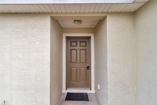 15711 SW 52nd Avenue Rd, Ocala, FL 34473 - entrance to property featuring stucco siding