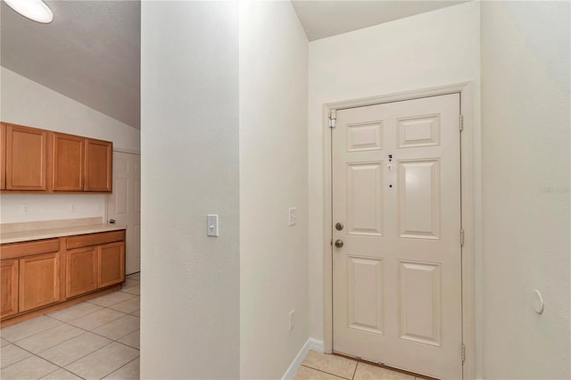 15711 SW 52nd Avenue Rd, Ocala, FL 34473 - entrance foyer featuring light tile patterned floors and vaulted ceiling