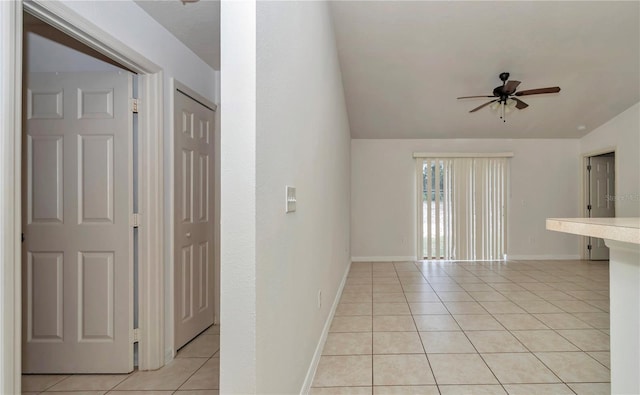 15711 SW 52nd Avenue Rd, Ocala, FL 34473 - unfurnished room featuring lofted ceiling, light tile patterned flooring, and a ceiling fan