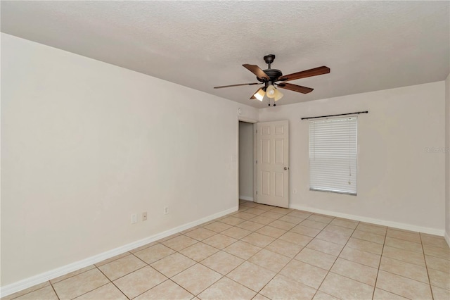 15711 SW 52nd Avenue Rd, Ocala, FL 34473 - spare room featuring ceiling fan, light tile patterned floors, and a textured ceiling