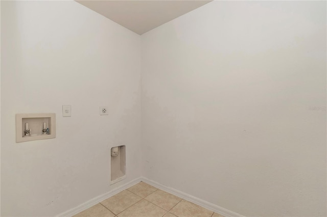 15711 SW 52nd Avenue Rd, Ocala, FL 34473 - laundry room with electric dryer hookup, washer hookup, and light tile patterned floors