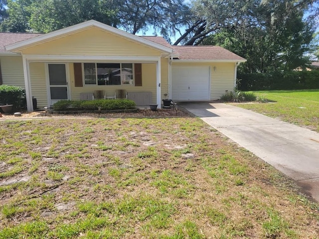 10917 SW 82nd Ter, Ocala, FL 34481 - ranch-style house featuring driveway, a front yard, and a garage