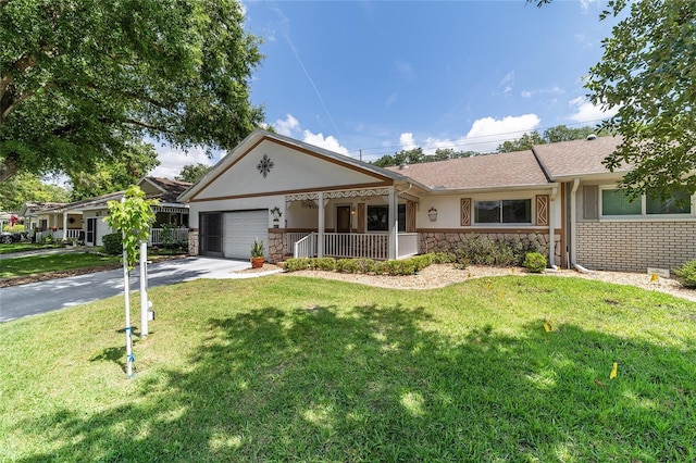 8881 SW 94th St Unit E, Ocala, FL 34481 - single story home with stone siding, driveway, an attached garage, a front lawn, and stucco siding