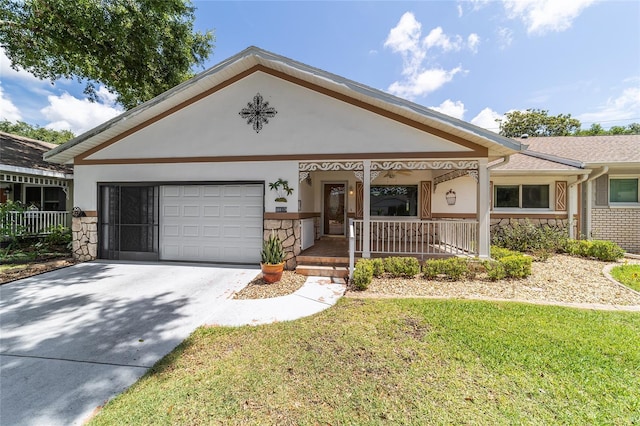 8881 SW 94th St Unit E, Ocala, FL 34481 - view of front of home with stone siding, a porch, a garage, stucco siding, and driveway