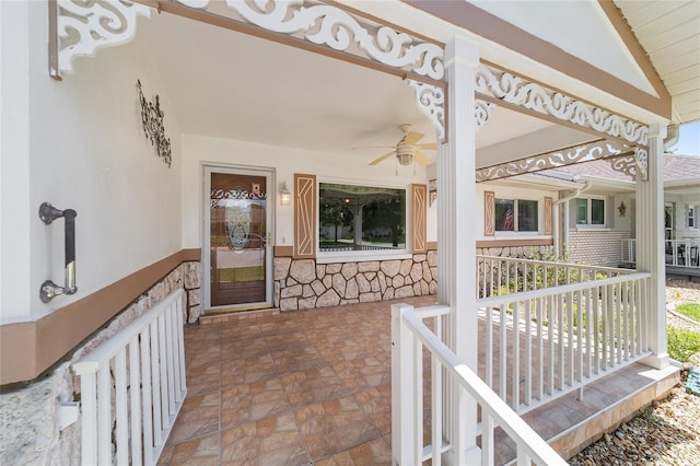 8881 SW 94th St Unit E, Ocala, FL 34481 - wooden porch featuring ceiling fan
