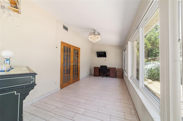 8881 SW 94th St Unit E, Ocala, FL 34481 - sunroom / solarium featuring french doors and lofted ceiling