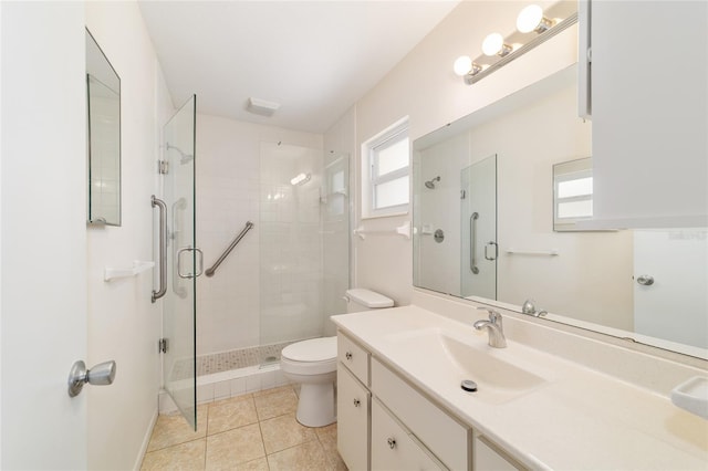 8881 SW 94th St Unit E, Ocala, FL 34481 - bathroom featuring vanity, a shower stall, and tile patterned floors