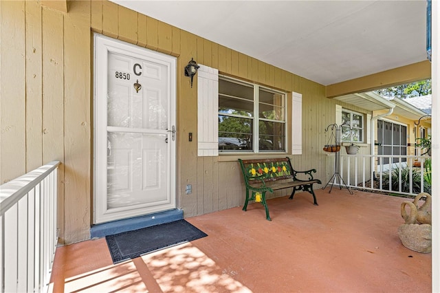 8850 SW 97th St Unit C, Ocala, FL 34481 - property entrance with a porch