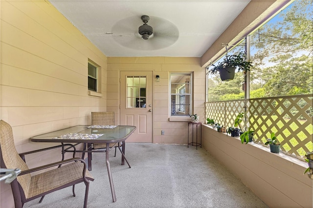 8850 SW 97th St Unit C, Ocala, FL 34481 - sunroom / solarium featuring ceiling fan and outdoor dining space