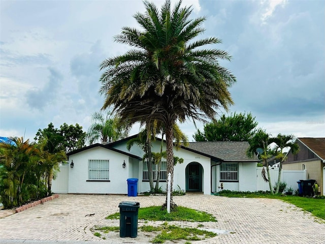 6806 Monique Ave, Tampa, FL 33625 - single story home with decorative driveway and stucco siding