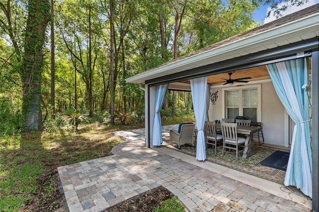 7242 SW 115th Pl, Ocala, FL 34476 - view of patio featuring a ceiling fan and outdoor dining area