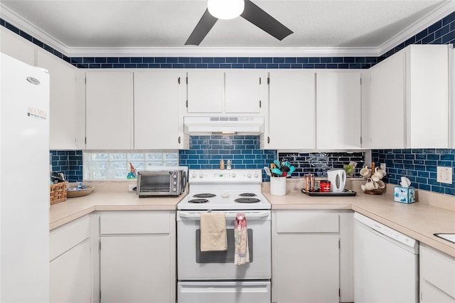 7242 SW 115th Pl, Ocala, FL 34476 - kitchen featuring white appliances, under cabinet range hood, ornamental molding, light countertops, and white cabinets