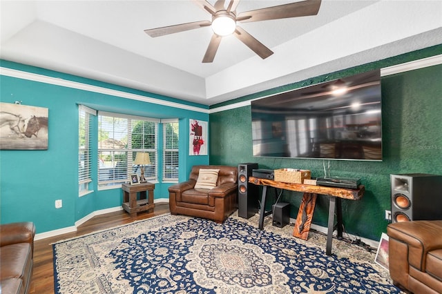 7242 SW 115th Pl, Ocala, FL 34476 - home office with wood finished floors, a ceiling fan, and a tray ceiling