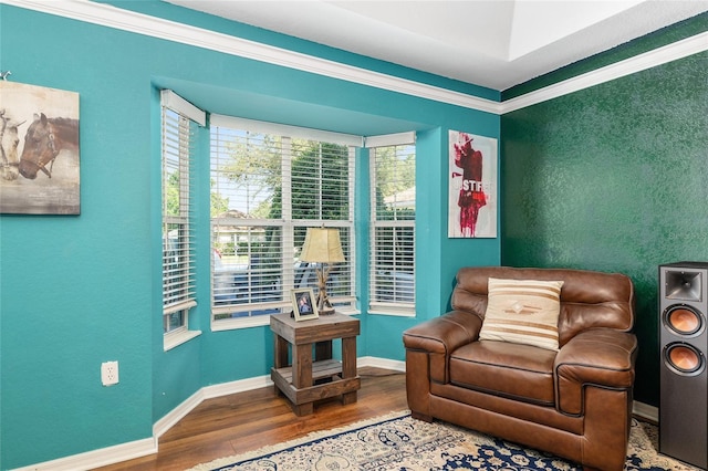 7242 SW 115th Pl, Ocala, FL 34476 - living area featuring wood finished floors and crown molding