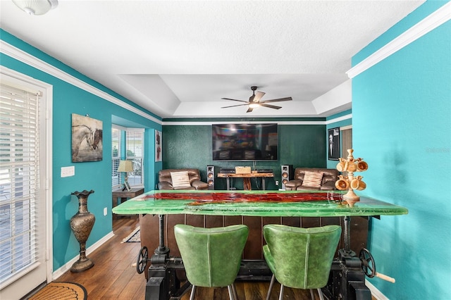 7242 SW 115th Pl, Ocala, FL 34476 - bar area featuring hardwood / wood-style floors, a ceiling fan, and a tray ceiling