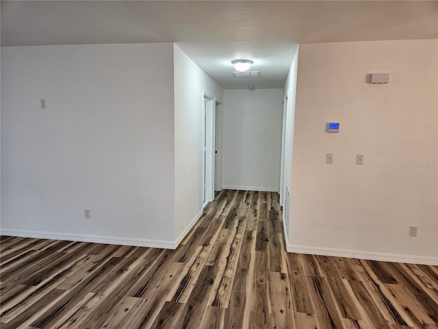 51 NE 10th St, Williston, FL 32696 - spare room featuring wood finished floors and baseboards