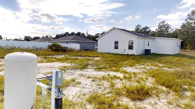 2728 SW 147th Ter, Ocala, FL 34481 - view of side of property with a central air condition unit