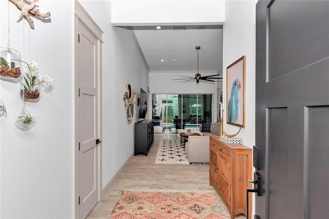 3196 W Mustang Blvd, Beverly Hills, FL 34465 - hallway with light wood finished floors and baseboards