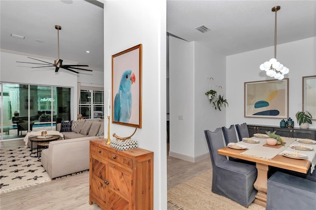3196 W Mustang Blvd, Beverly Hills, FL 34465 - dining area with light wood-type flooring, ceiling fan, and recessed lighting
