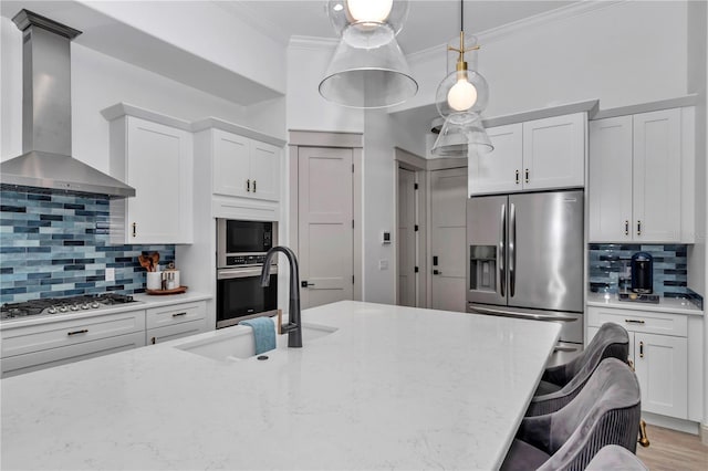 3196 W Mustang Blvd, Beverly Hills, FL 34465 - kitchen with wall chimney range hood, appliances with stainless steel finishes, crown molding, backsplash, and white cabinets