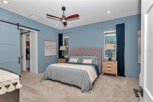 3196 W Mustang Blvd, Beverly Hills, FL 34465 - bedroom featuring light carpet, a barn door, ceiling fan, and recessed lighting