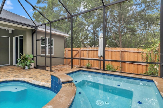 3196 W Mustang Blvd, Beverly Hills, FL 34465 - view of swimming pool featuring a patio area, a lanai, and a pool with connected hot tub