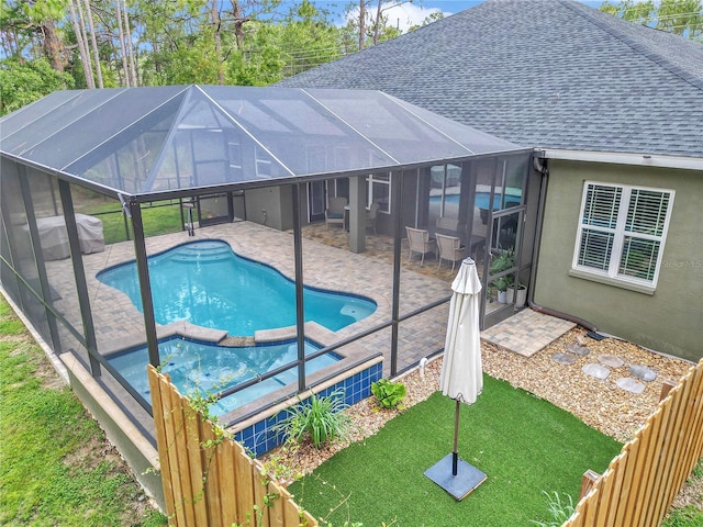 3196 W Mustang Blvd, Beverly Hills, FL 34465 - view of swimming pool featuring a patio, a lanai, and a pool with connected hot tub