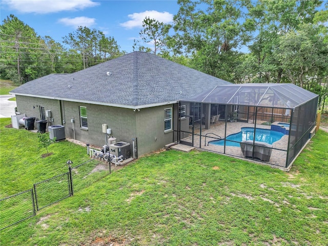 3196 W Mustang Blvd, Beverly Hills, FL 34465 - rear view of property featuring a shingled roof, a gate, stucco siding, a patio area, and a fenced backyard