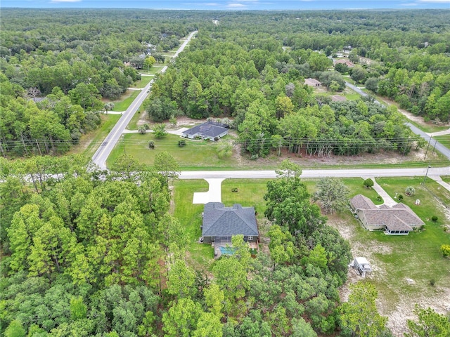 3196 W Mustang Blvd, Beverly Hills, FL 34465 - aerial overview of property's location with a forest