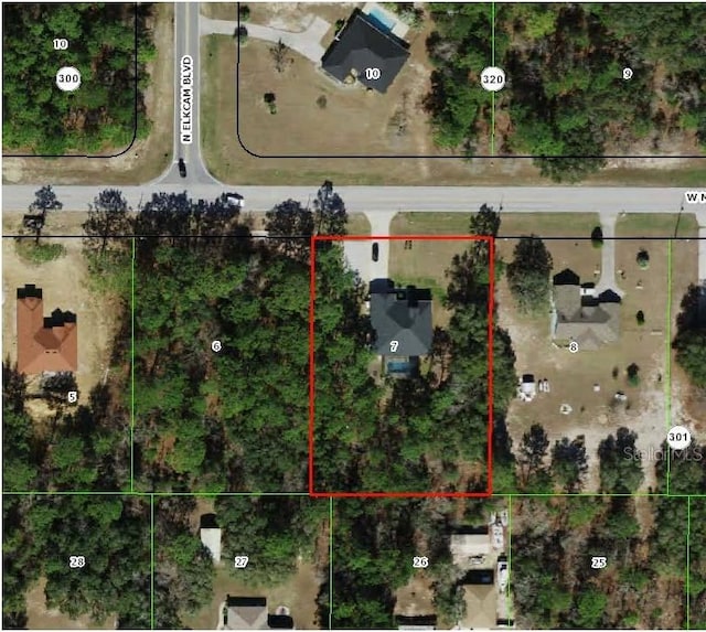 3196 W Mustang Blvd, Beverly Hills, FL 34465 - aerial view of property's location with property parcel outlined