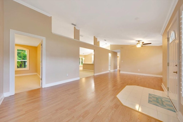 3769 Grove View Ln, Port Orange, FL 32129 - unfurnished living room featuring light wood finished floors, ceiling fan, and crown molding