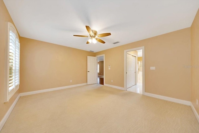 3769 Grove View Ln, Port Orange, FL 32129 - unfurnished bedroom featuring light carpet and multiple windows