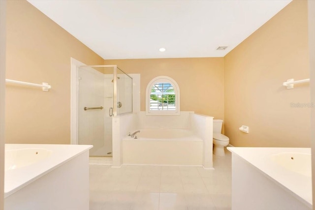3769 Grove View Ln, Port Orange, FL 32129 - full bathroom with vanity, a stall shower, a bath, tile patterned floors, and recessed lighting
