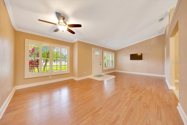 3769 Grove View Ln, Port Orange, FL 32129 - unfurnished living room with a ceiling fan, crown molding, light wood finished floors, and vaulted ceiling