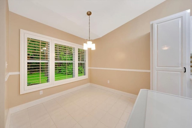 3769 Grove View Ln, Port Orange, FL 32129 - unfurnished dining area featuring a chandelier, lofted ceiling, and tile patterned floors